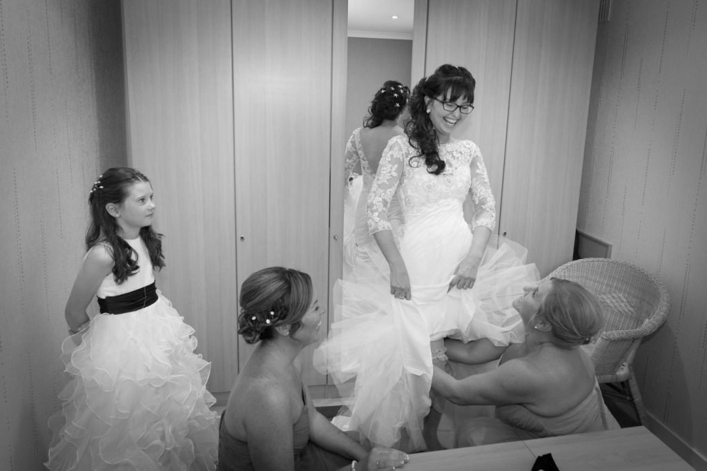 Beautiful bride getting ready with bridesmaids and flower girl in the Scottish Borders.