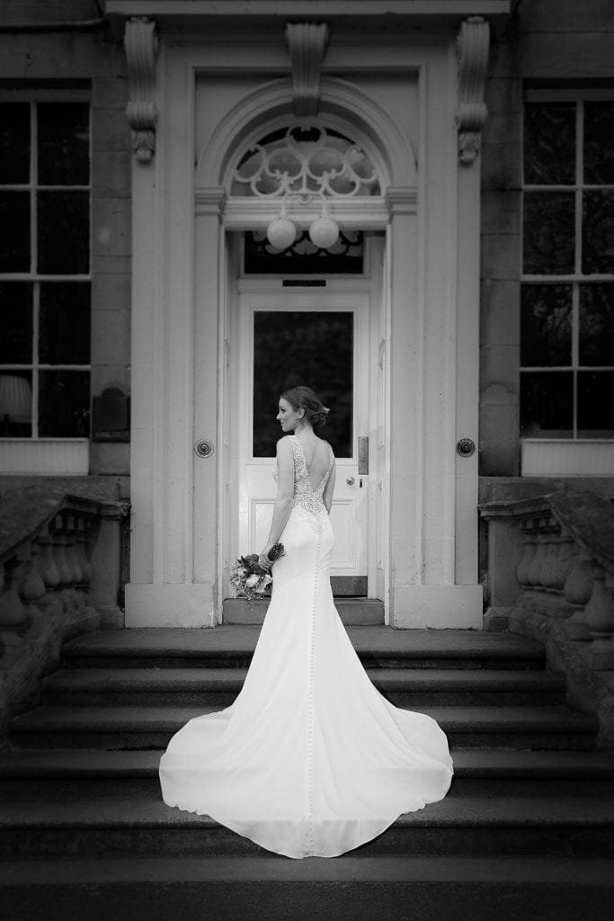 Scottish Borders Wedding. Elegant bride outside historic building.