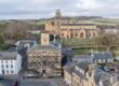 Drone Shot of the Burgh Halls with Linlithgow Palace in background