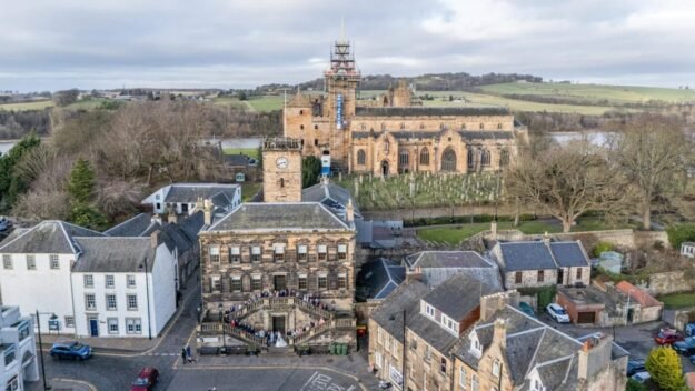 Drone Shot of the Burgh Halls with Linlithgow Palace in background