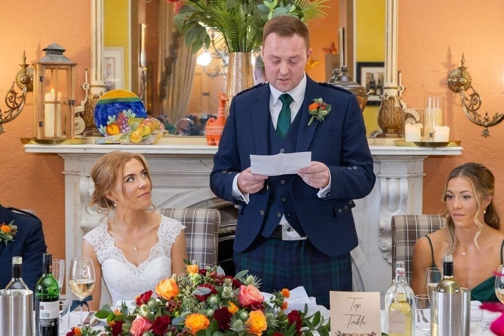 Beautiful Scottish Borders wedding photographer capturing heartfelt moments at the wedding reception.