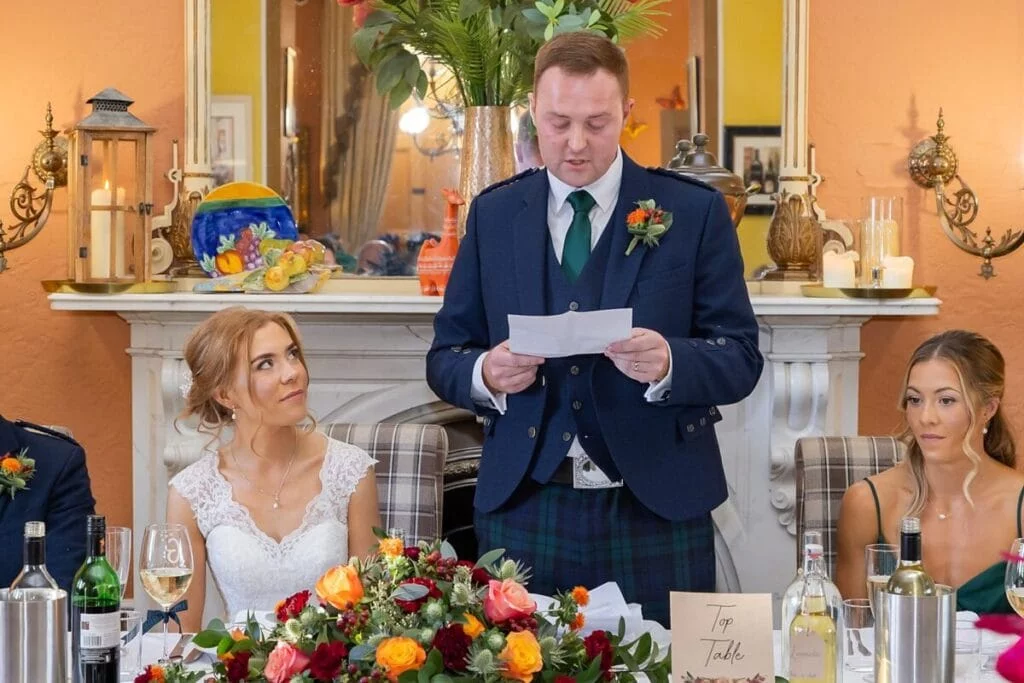 Beautiful Scottish Borders wedding photographer capturing heartfelt moments at the wedding reception.